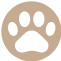 A beige paw print icon with four toes and a pad in the center, set against a circular white background, representing the highest quality craftsmanship.